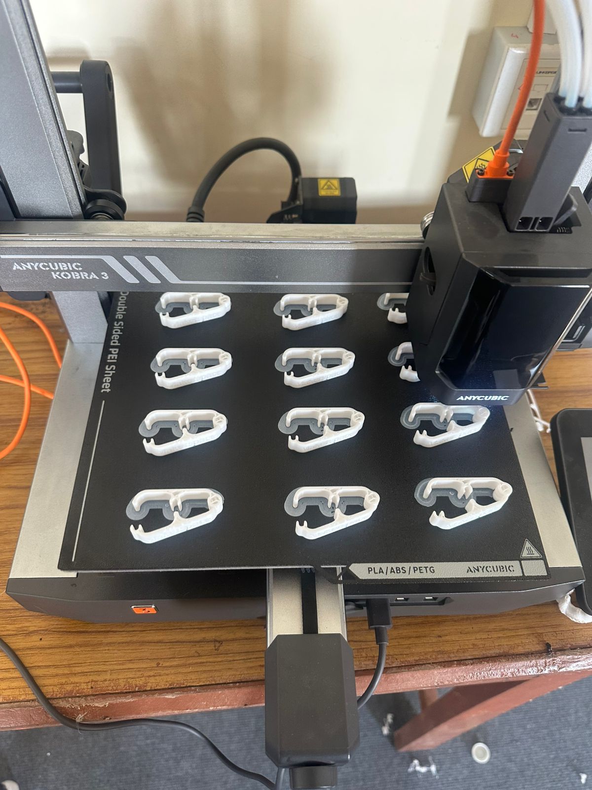 3D printed carabiner clips fresh off the Anycubic Kobra 3